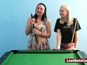 A big tits lesbian couple playing billiard and using the stick in a new way