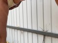 Milf in boots pees at the fence