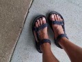 My male pedicured feet in sandals