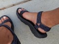 My male pedicured feet in sandals