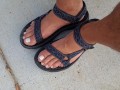 My male pedicured feet in sandals