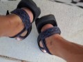 My male pedicured feet in sandals