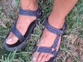 My male pedicured feet in sandals