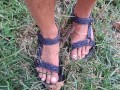 My male pedicured feet in sandals