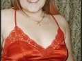 redheaded sexy girl in red clothes