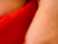 Red latex panties and a dildo