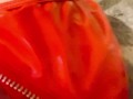 Red latex panties and a dildo