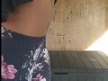 Fit black girl does squats in backyard after school