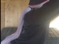 Fit black girl does squats in backyard after school