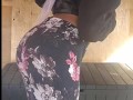 Fit black girl does squats in backyard after school