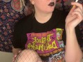 smoking a cigarette with black lipstick