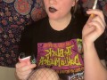smoking a cigarette with black lipstick