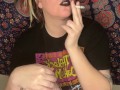 smoking a cigarette with black lipstick
