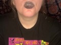 smoking a cigarette with black lipstick
