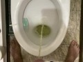 Morning pissing in the toilet with an uncircumcised penis, view from the eyes