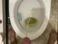 Morning pissing in the toilet with an uncircumcised penis, view from the eyes