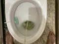 Morning pissing in the toilet with an uncircumcised penis, view from the eyes