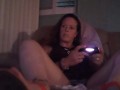 Busty Wife In Red Mini Dress Playing Video Games and Smoking Cigarettes
