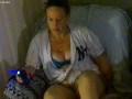 Pretty busty girl in her unbutton base ball jersey showing off bra and panties, feet and cleavage