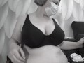 A mature BBW milf with big natural saggy tits tries on bras.