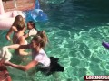 Four girls are enjoying stripping in the swimming pool, with one lucky guy joining them