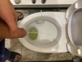 Guy pees uncut dick in toilet