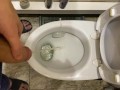 Guy pees uncut dick in toilet