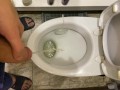 Guy pees uncut dick in toilet