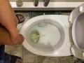 Guy pees uncut dick in toilet