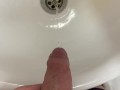Guy pees uncut dick in sink