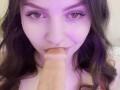 beauty sweetly sucks a thick dildo