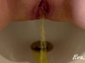 big open vagina pissing yellow urine in a bidet