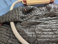 Vacuuming Dark Shark Ghost Whisperer Down Jacket with Vintage Electrolux Vacuum Cleaner