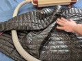 Vacuuming Dark Shark Ghost Whisperer Down Jacket with Vintage Electrolux Vacuum Cleaner
