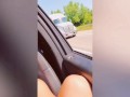 Horny married MILF fingers herself in public for truckers while husband drives.
