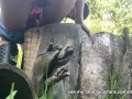 Girl uses a log as a toilet to pee