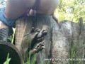 Girl uses a log as a toilet to pee