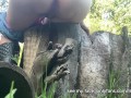 Girl uses a log as a toilet to pee
