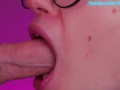 Close blowjob with lip gloss with juicy cum on  tongue