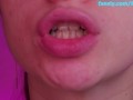 Close blowjob with lip gloss with juicy cum on  tongue