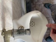 Peeing in a public toilet view from the eyes