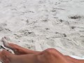 Teen with small saggy tits showing off to strangers on a public beach
