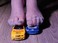 Crushing miniature model cars covered in baby oil wearing my nylon stockings