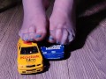 Crushing miniature model cars covered in baby oil wearing my nylon stockings