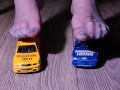 Crushing miniature model cars covered in baby oil wearing my nylon stockings