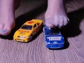 Crushing miniature model cars covered in baby oil wearing my nylon stockings
