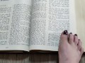 Using my long finger toes to flip through the pages of a Bible with my clean barefeet