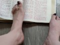 Using my long finger toes to flip through the pages of a Bible with my clean barefeet