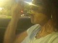 Milf smoking cigarettes while in passenger seat in vehicle