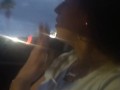 Milf smoking cigarettes while in passenger seat in vehicle